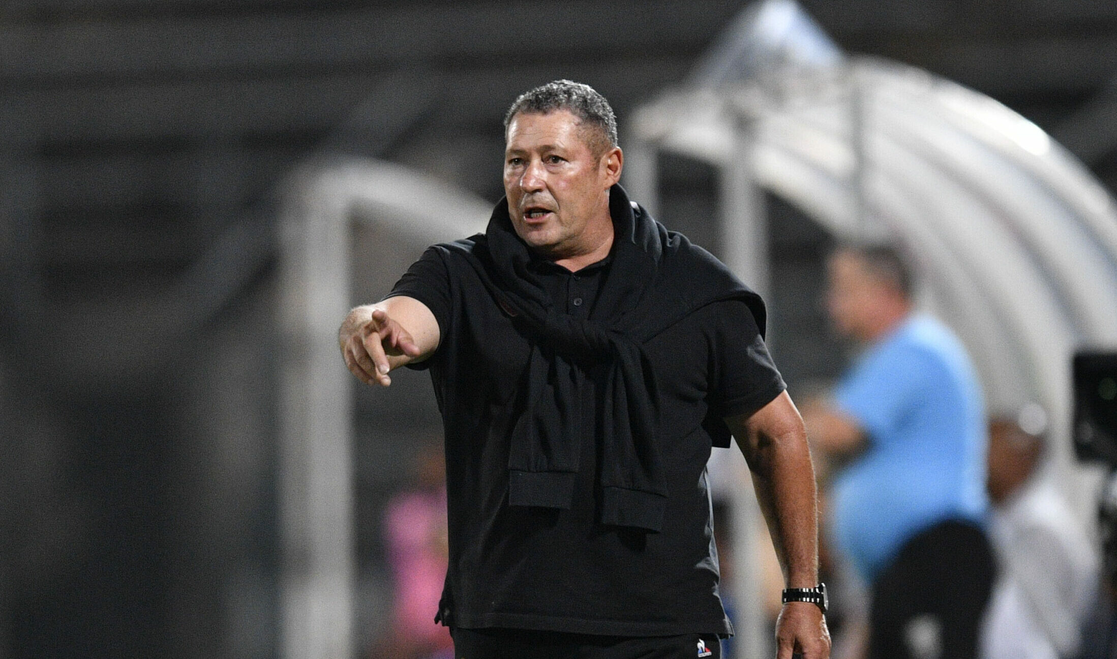 Barker Reunites With Former Player